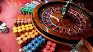 Live dealer explaining Sic Bo bets